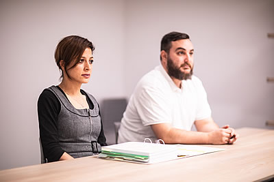 A woman and a man sitting at a table